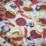 Easy and delicious homemade pizza. Restaurant quality pizza, made at home for a fraction of the cost.