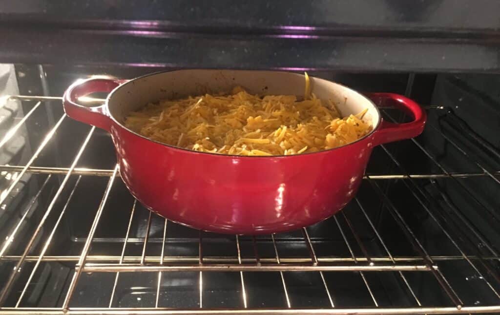 chili with cornbread baking in oven