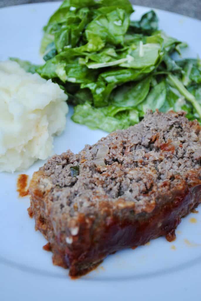 Classic Italian meatloaf with mashed potatoes and salad