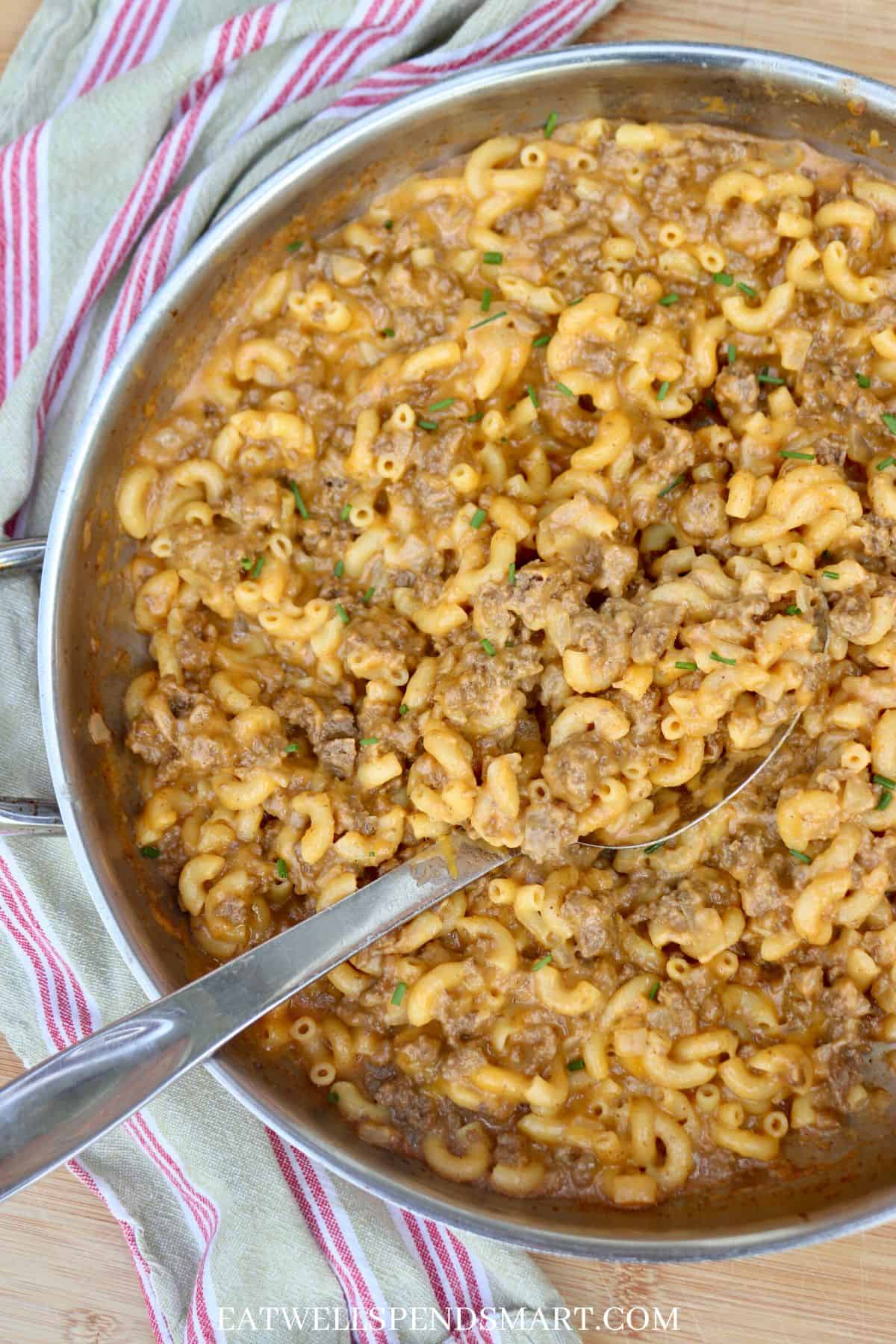 homemade cheeseburger macaroni in a stainless steel skillet