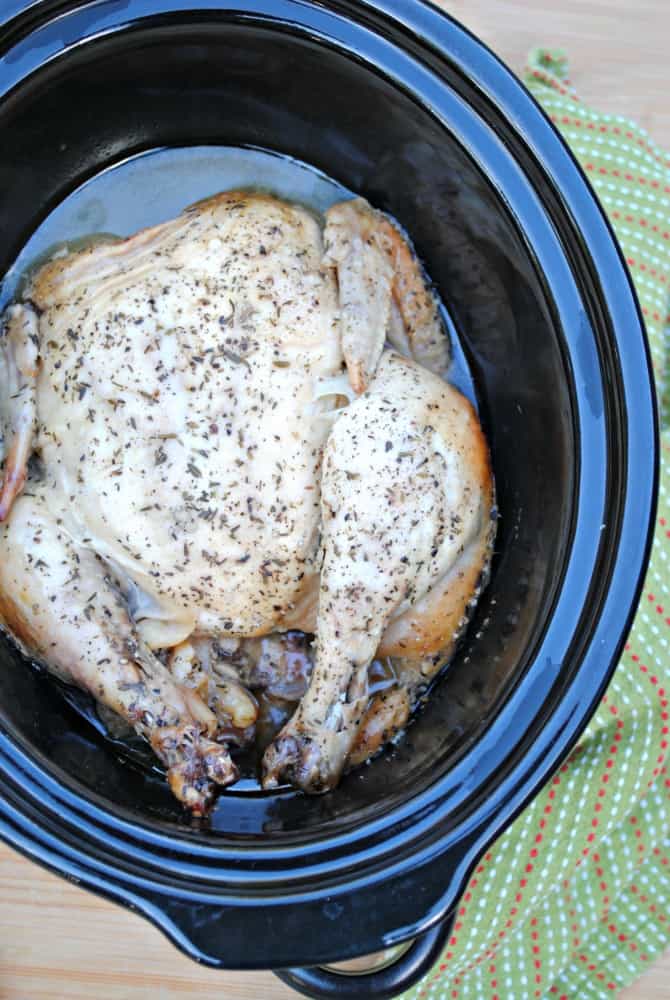 A whole chicken in a slow cooker