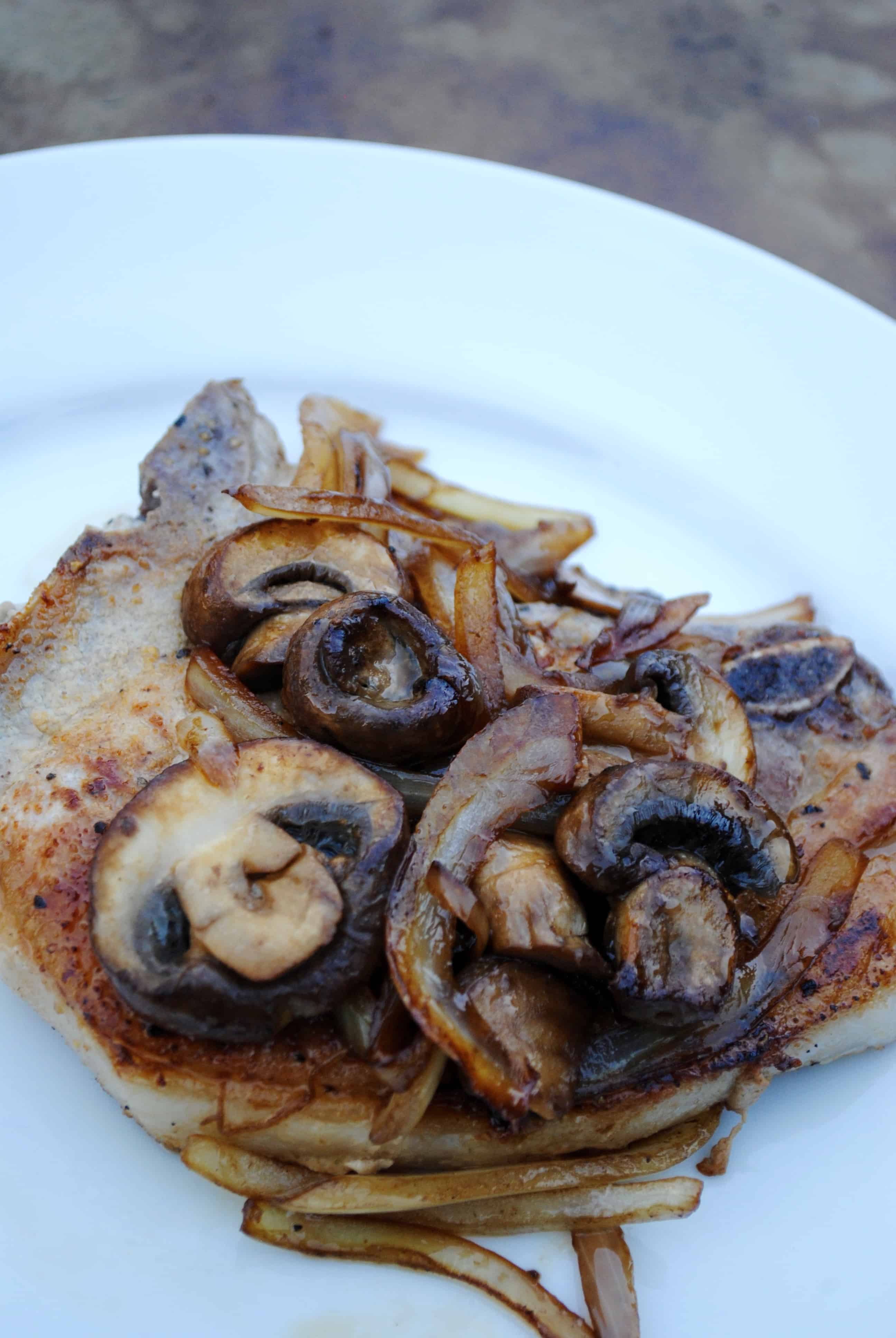 Pork chops smothered with onions and mushrooms. Simple meal, big on flavor.