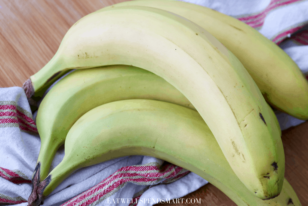 Bunch of bananas on a striped towel