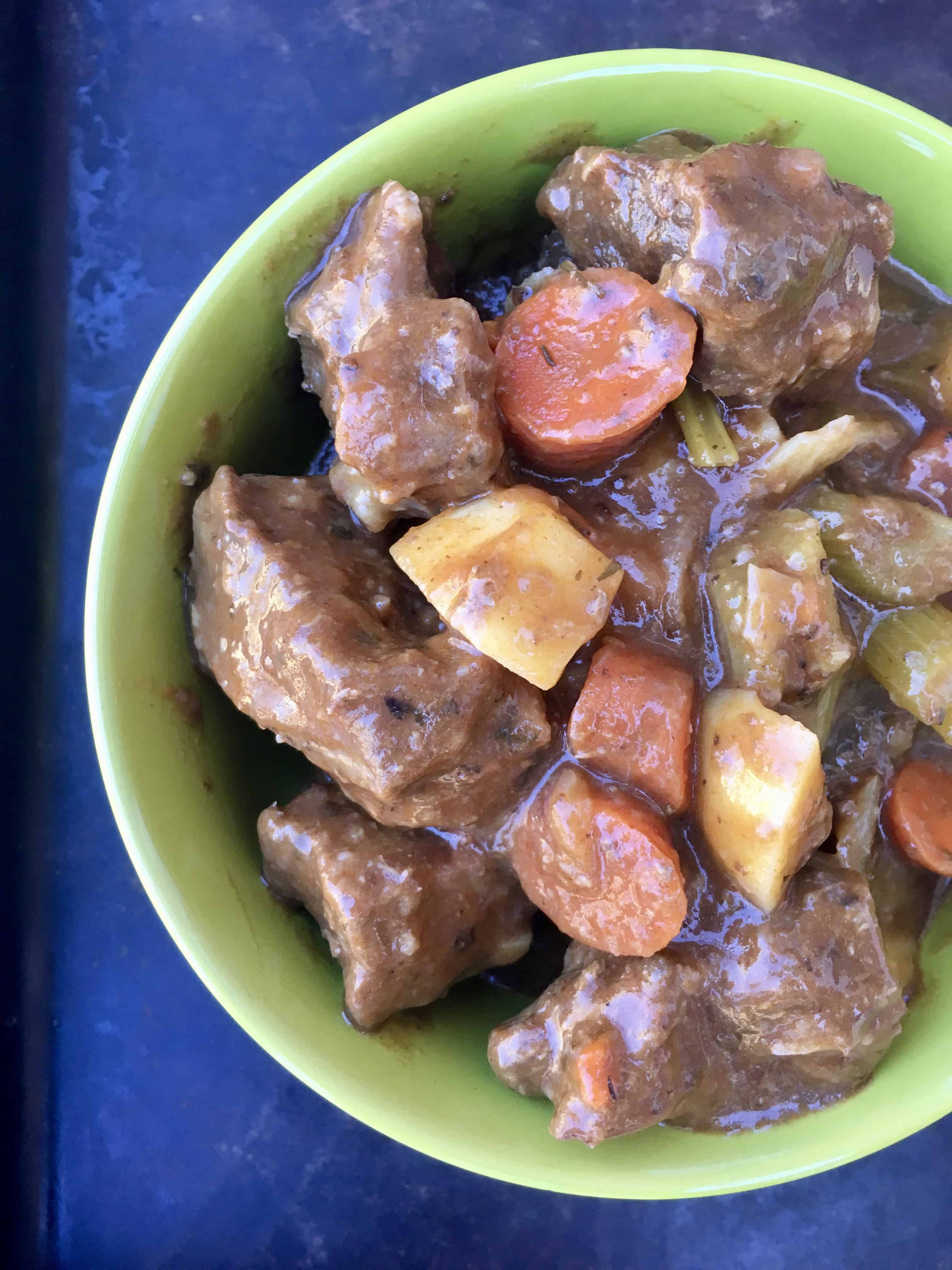 Instant Pot Beef Stew in a green bowl