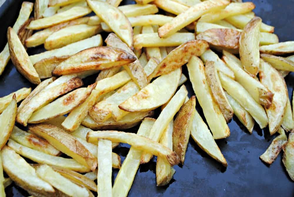 Crispy oven fries on a baking stone