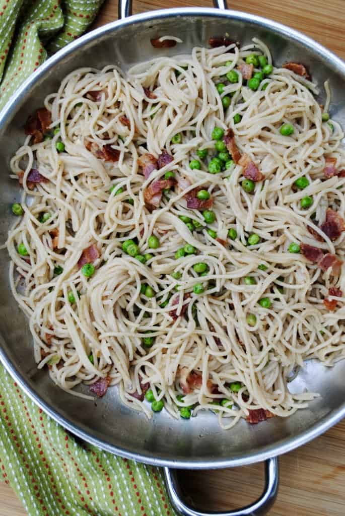 Pasta with bacon and peas. A simple inexpensive meal.