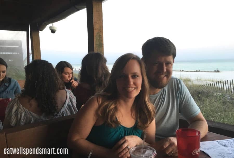 couple eating at restaurant on the beach