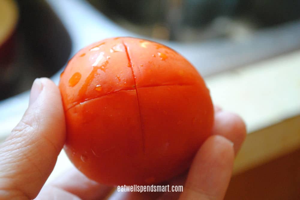 Scored tomato for blanching and freezing