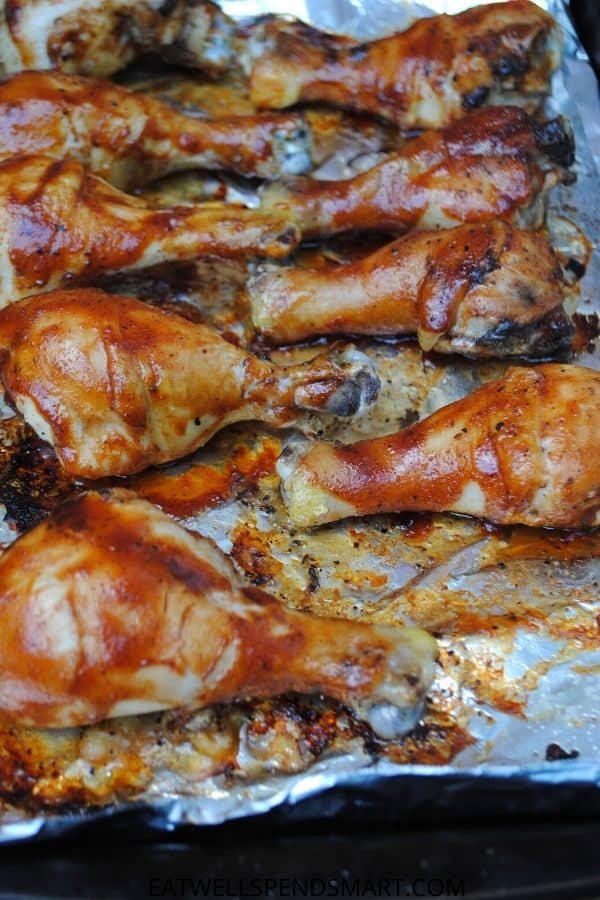 bbq chicken legs on a baking sheet
