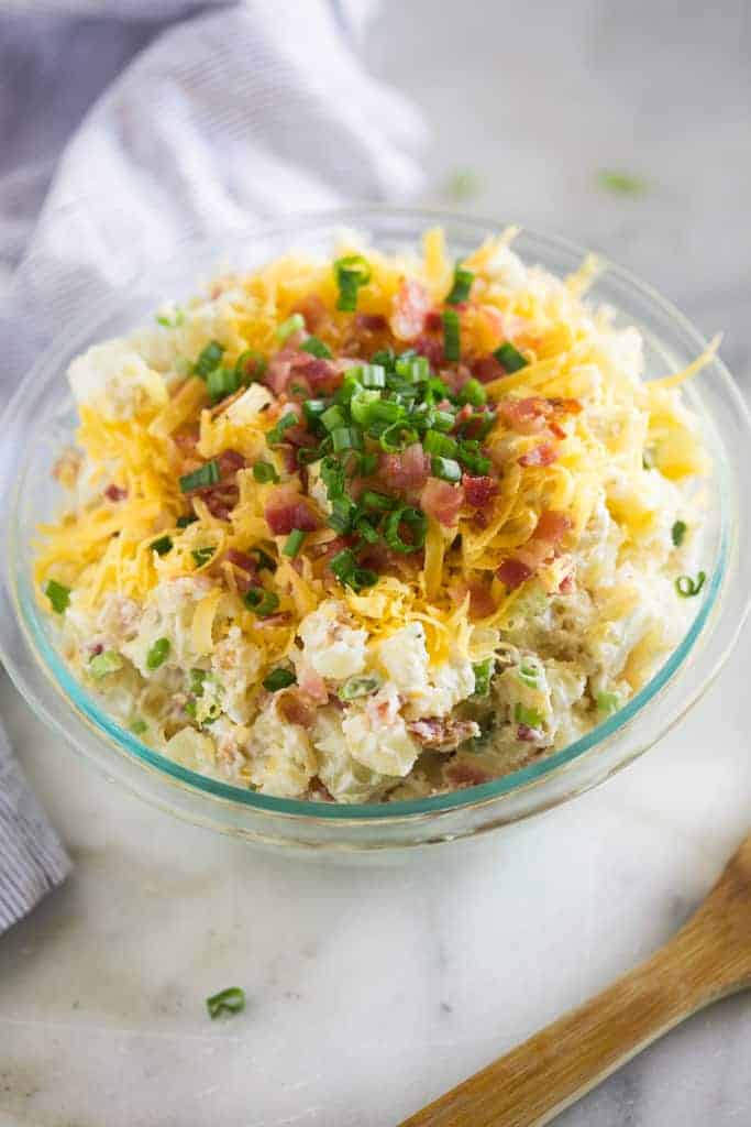 baked potato salad in a glass bowl