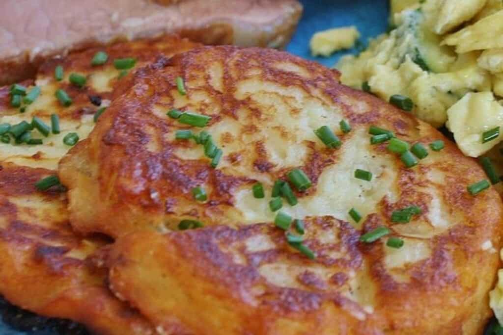 potato pancakes with chives on a plate
