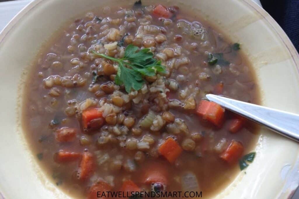 lentil soup in a yellow bowl