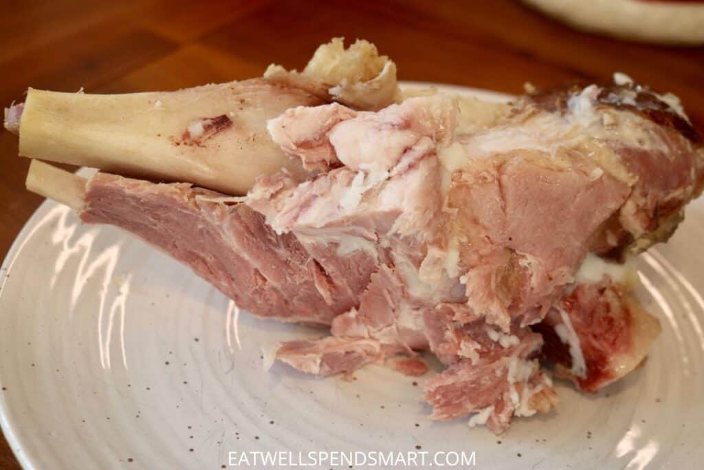 leftover ham bone on a plate